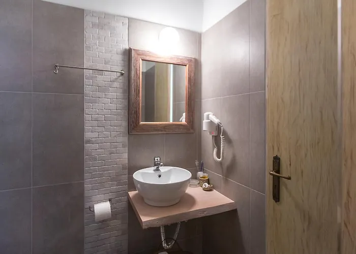 Ammos Πανσιόν Τολό